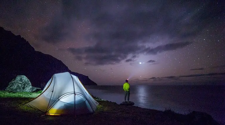 Man Camping in sea side