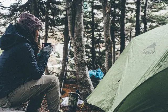 warm camping drinking coffee