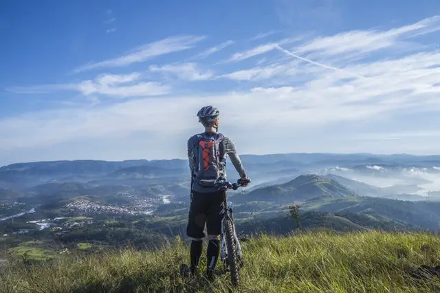 Man Cycling in Mountain